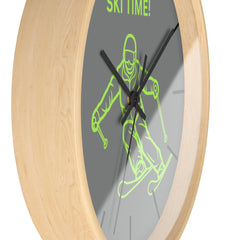 Modern Green Ski Wall Clock on white wall. Eco-friendly ski decor for modern homes. Ski lover gift with green minimalist design. Unique ski wall clock with mountain theme.