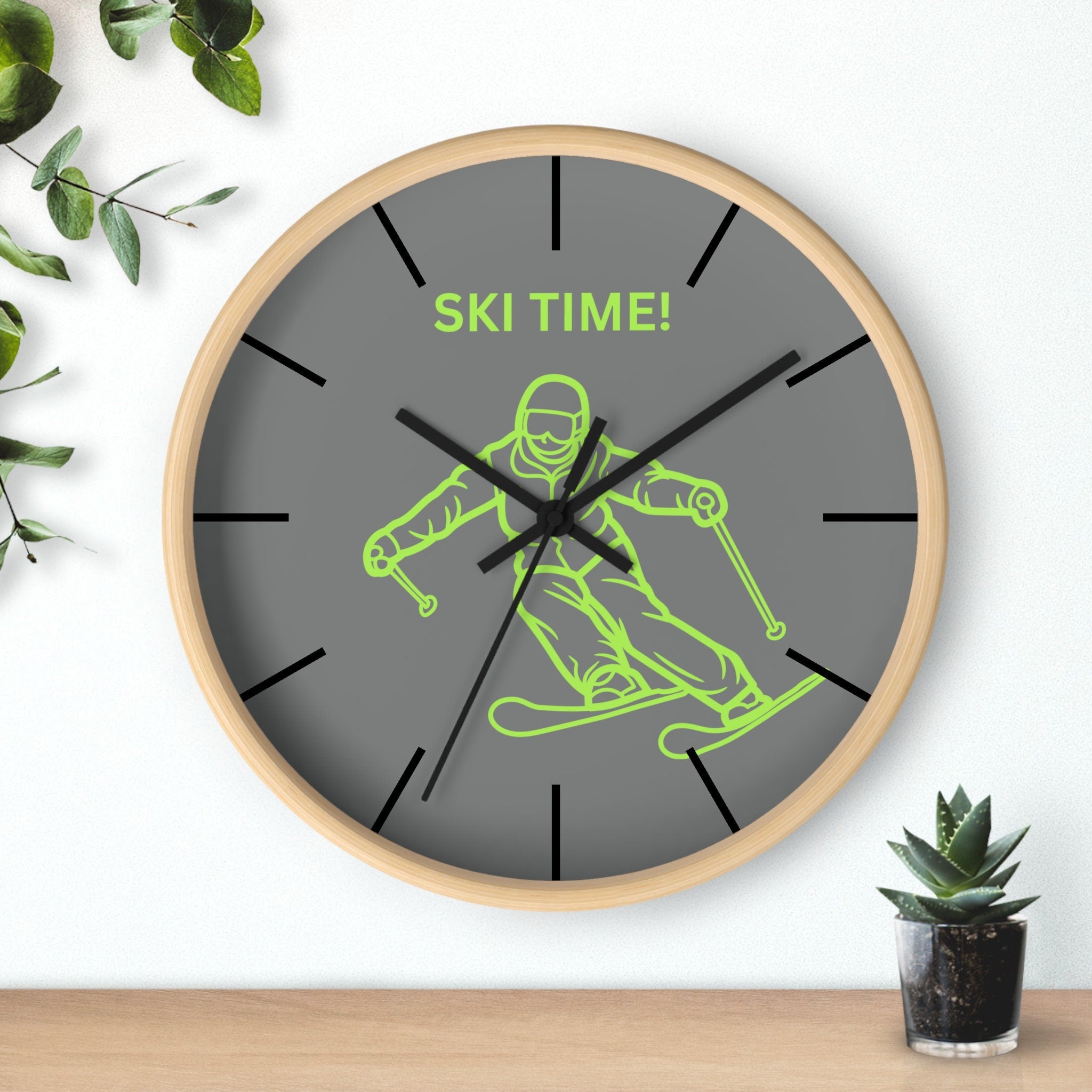 Green ski clock for rustic or modern interiors. Sustainable ski-themed home decoration. Limited edition ski wall clock in green. Cool skiing accessories for home decor. Modern ski lodge decoration idea. Gift for him – ski wall clock in green.