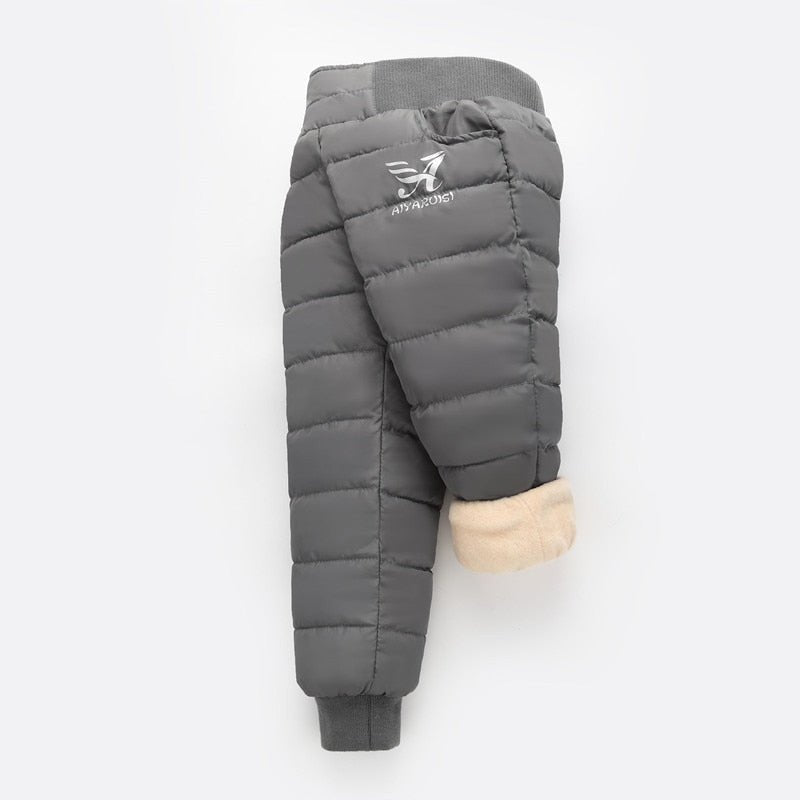 High-Rise Snow Pants For Kids. Flexible Winter Pants For Children. Kids Snow Pants With Storage Pockets.