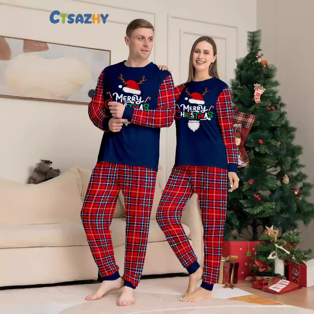 Navy Christmas pajama top with red plaid sleeves and matching plaid pants - Best Gifter Ever