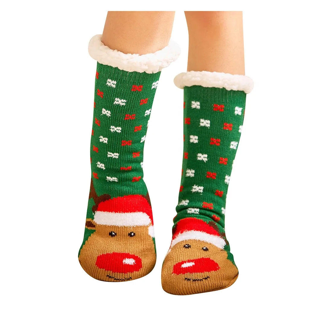 Women's Christmas socks, green with white snowflakes and reindeer in Santa hat feet, fuzzy cuffs