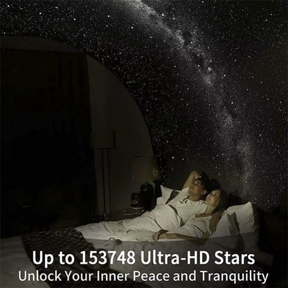 Galaxy star projector filling a dark bedroom ceiling with Milky Way stars