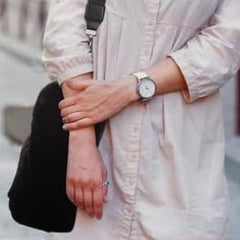 Fillable carry-on velvet handbag with zipper and shoulder strap.