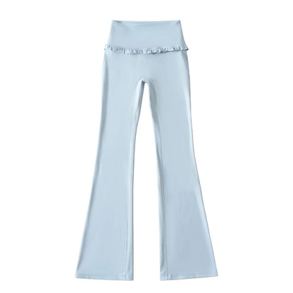 Solid color flared yoga pants with feminine ruffle hem