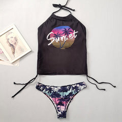 Halter tankini swimsuit shown with graphic print details and a wireless padded top. This women’s tankini with side tie bottoms provides flexibility, comfort, and modern swim style.